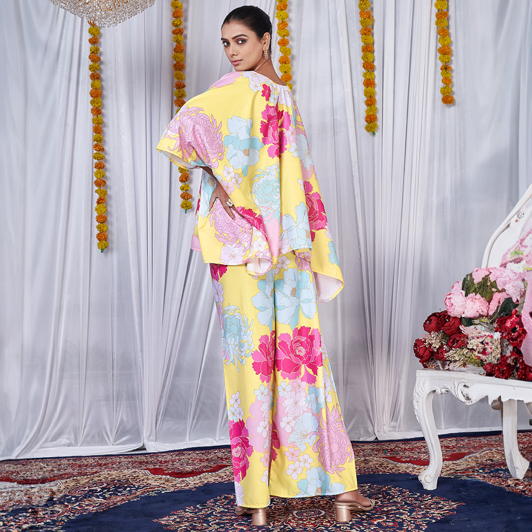 A stylish floral printed kaftan style co-ord set with flowing sleeves and matching wide-leg pants.