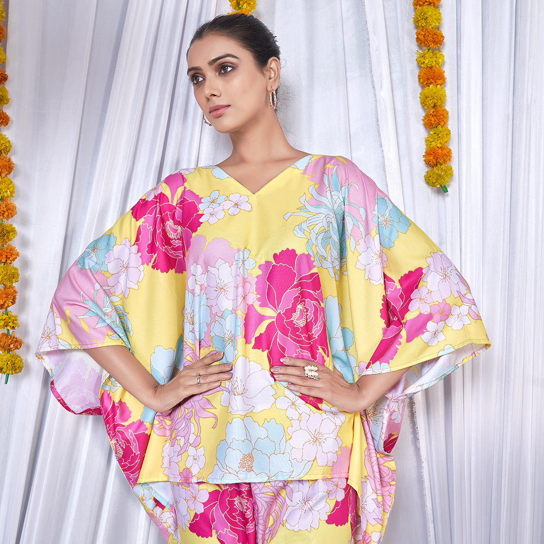 A stylish floral printed kaftan style co-ord set with flowing sleeves and matching wide-leg pants.