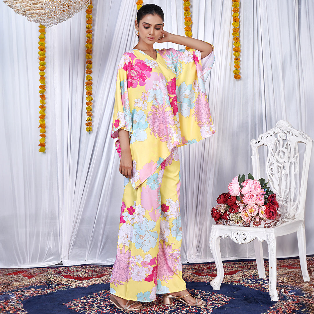 A stylish floral printed kaftan style co-ord set with flowing sleeves and matching wide-leg pants.