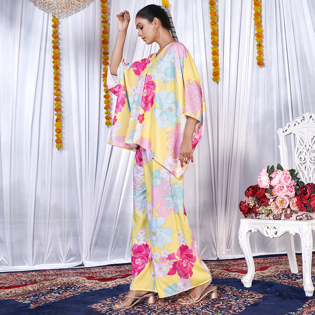 A stylish floral printed kaftan style co-ord set with flowing sleeves and matching wide-leg pants.