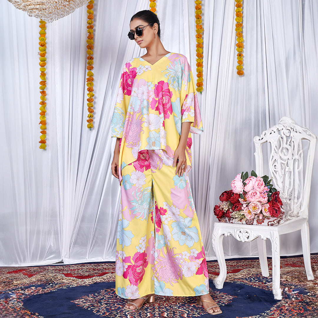 A stylish floral printed kaftan style co-ord set with flowing sleeves and matching wide-leg pants.