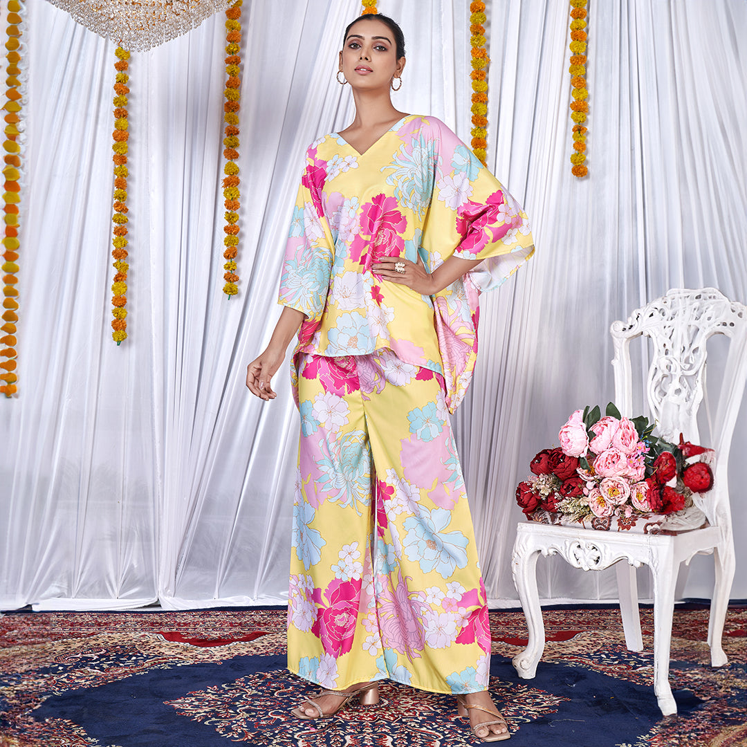 A stylish floral printed kaftan style co-ord set with flowing sleeves and matching wide-leg pants.