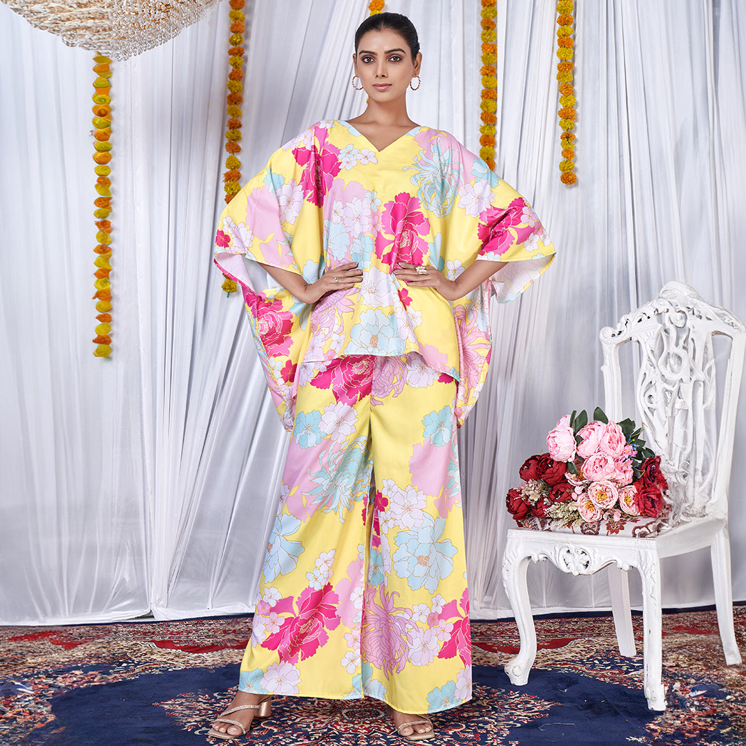 A stylish floral printed kaftan style co-ord set with flowing sleeves and matching wide-leg pants.