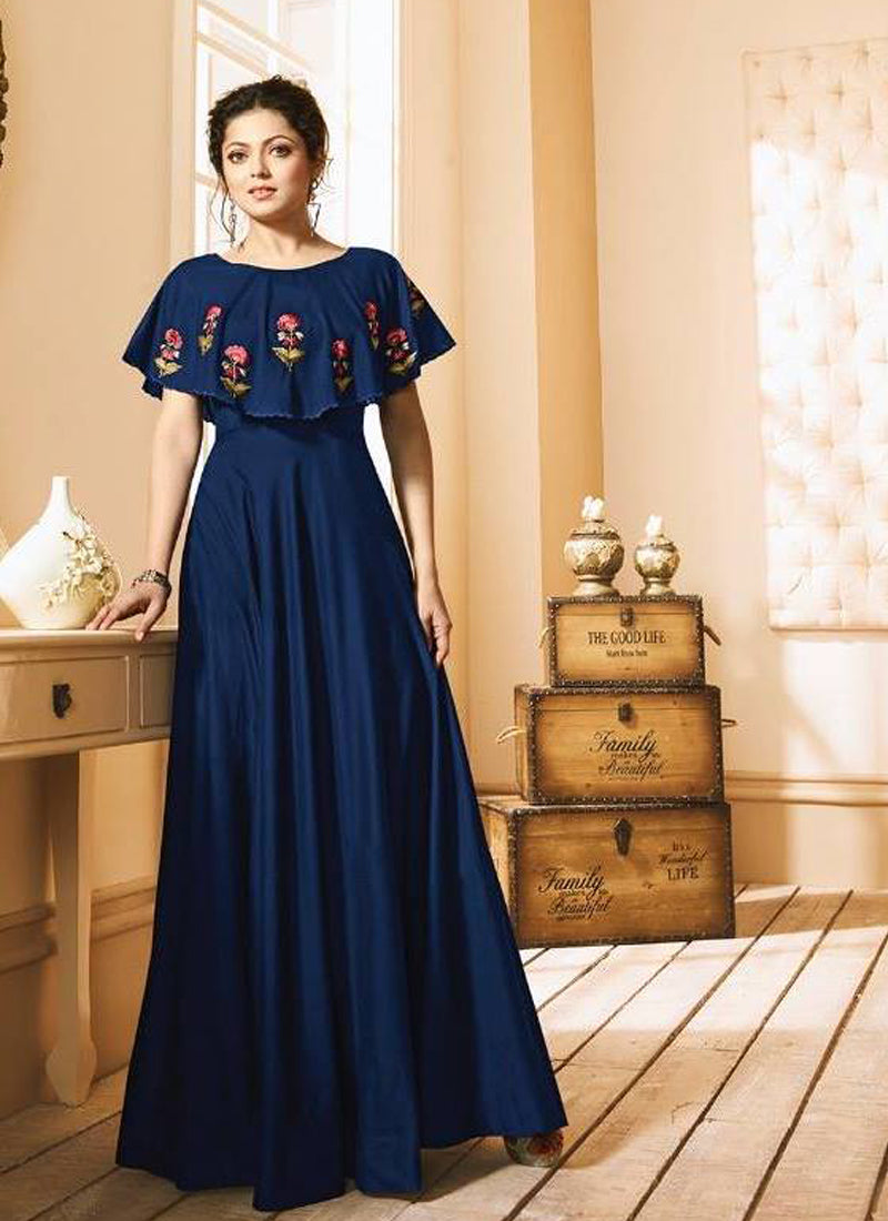 A model wearing a Glorious Blue Taffeta Silk Readymade Gown, highlighting its lustrous fabric and elegant design.