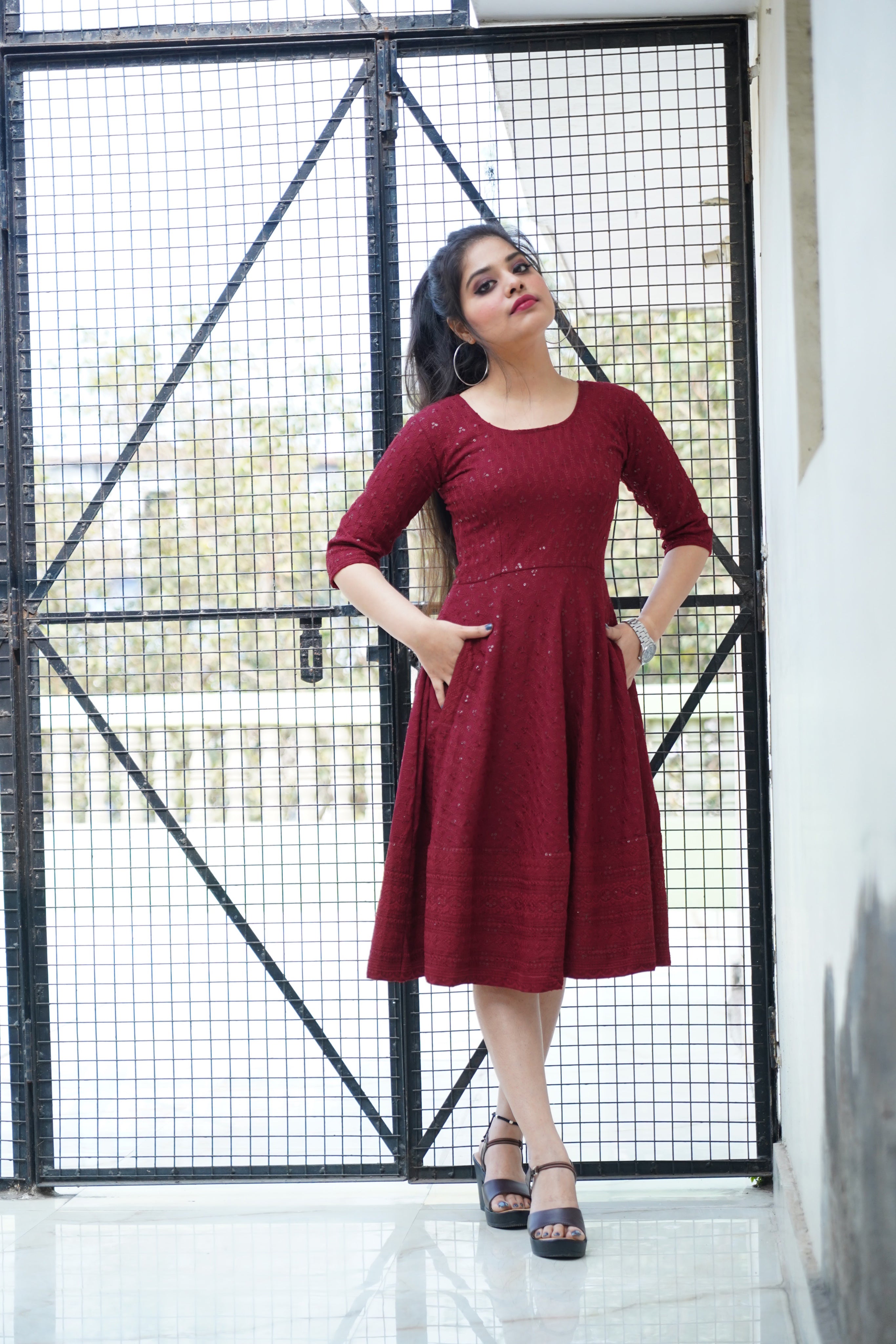 Elegant maroon rayon dress featuring intricate Lucknowi Chikankari embroidery, perfect for parties and special occasions.