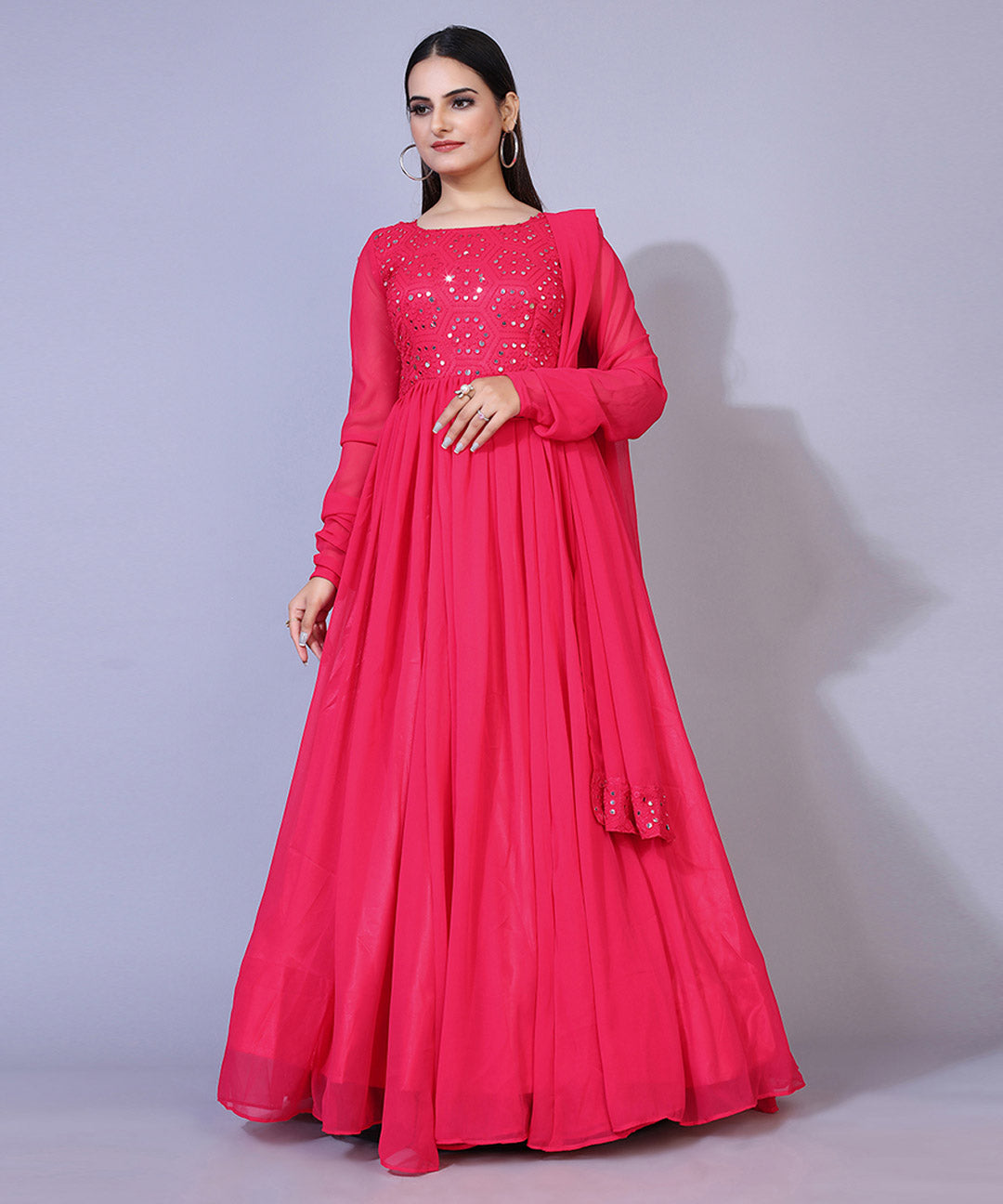 Pink mirror embroidered georgette Anarkali style gown, perfect for festive and traditional occasions.