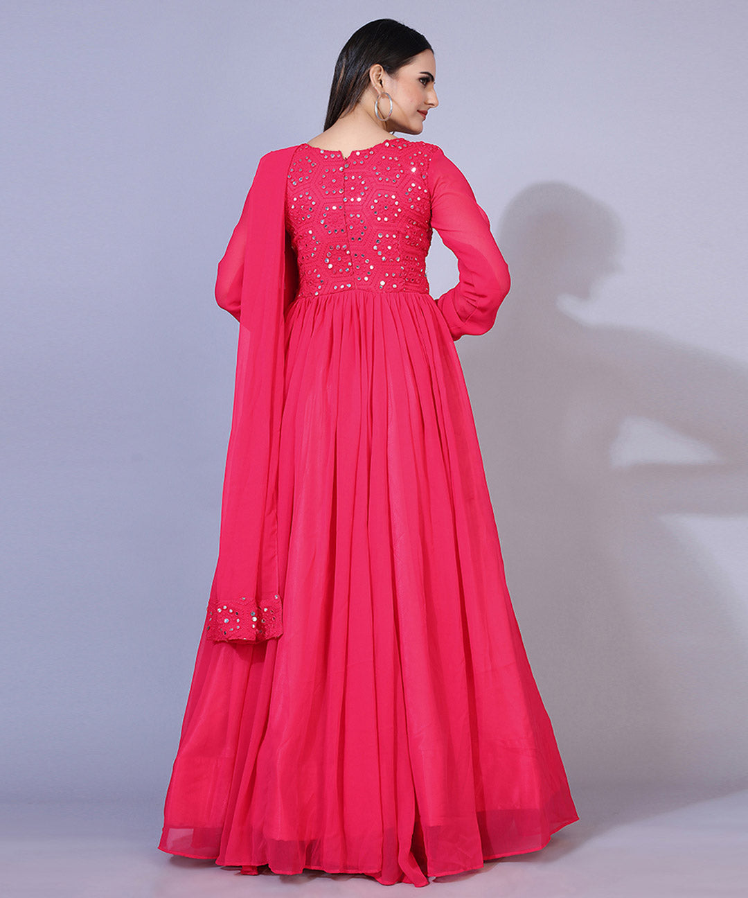 Pink mirror embroidered georgette Anarkali style gown, perfect for festive and traditional occasions.