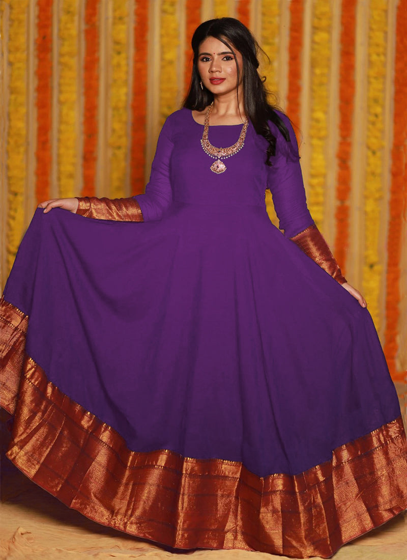 Elegant purple party wear woven georgette gown offering a refreshing and stylish look for special occasions.