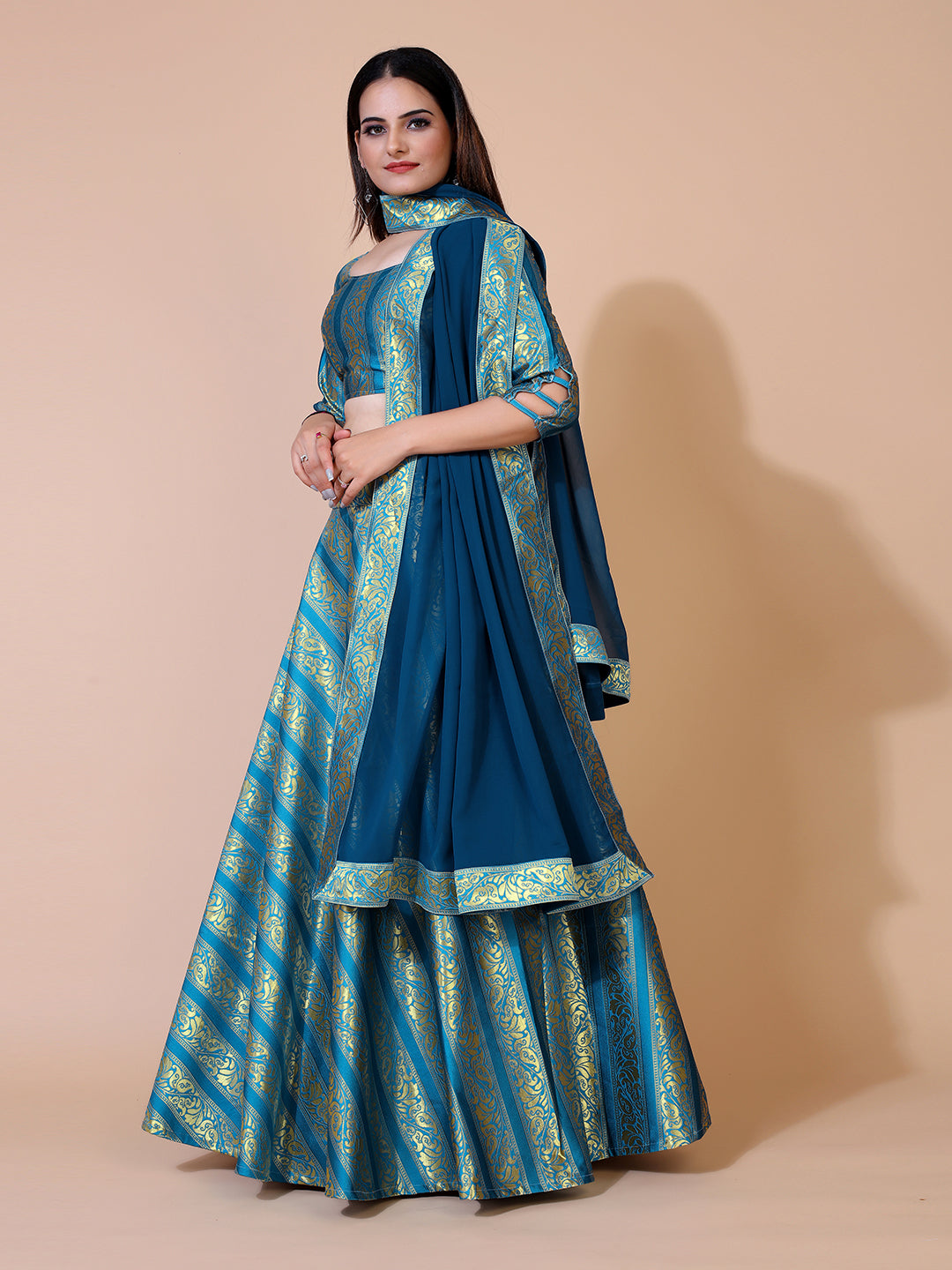 Stunning teal lehenga with a ready-to-wear blouse and matching dupatta, perfect for a festive occasion.