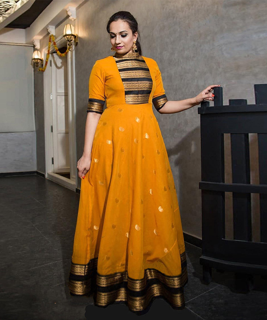 Classy Mustard Colored Party Wear Silk Jacquard Weaving Work Gown