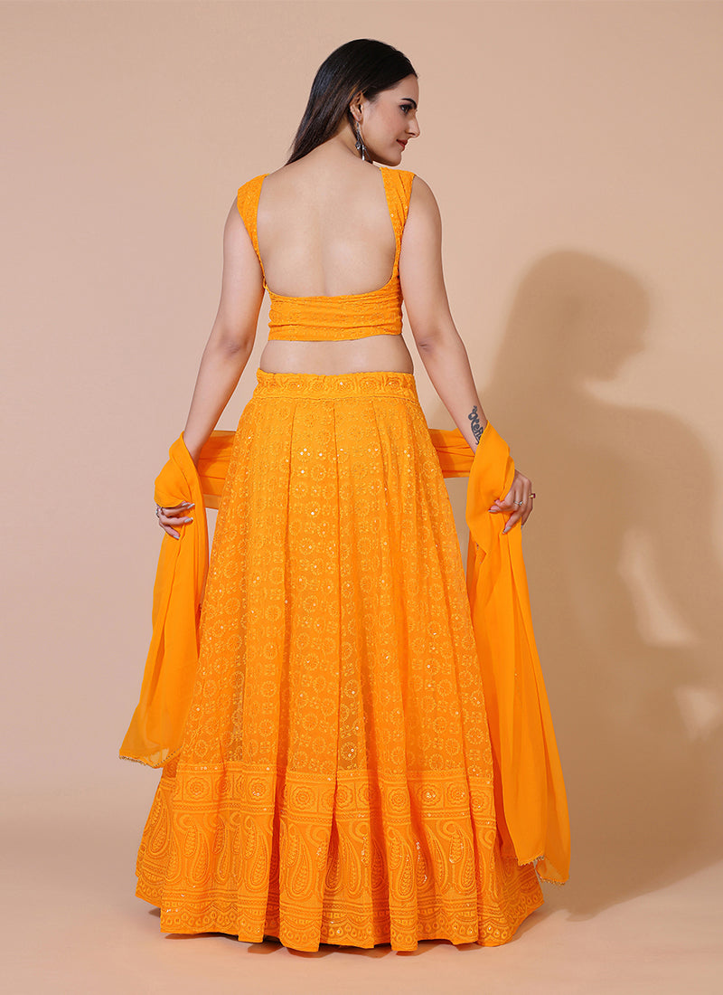 Dusty orange lehenga choli with traditional Lucknowi chikankari embroidery.     tune  share   more_vert